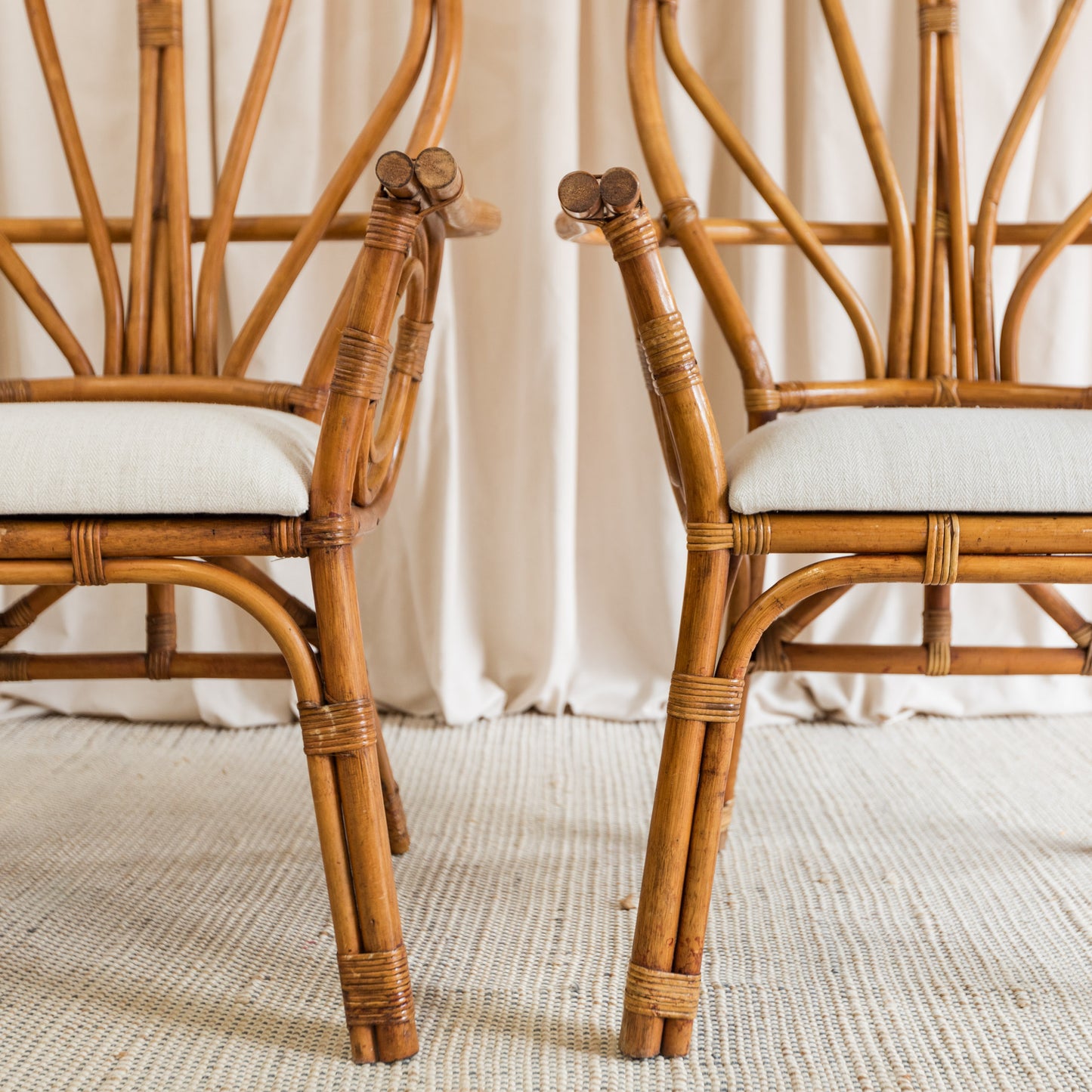 Rattan upholstered armchairs