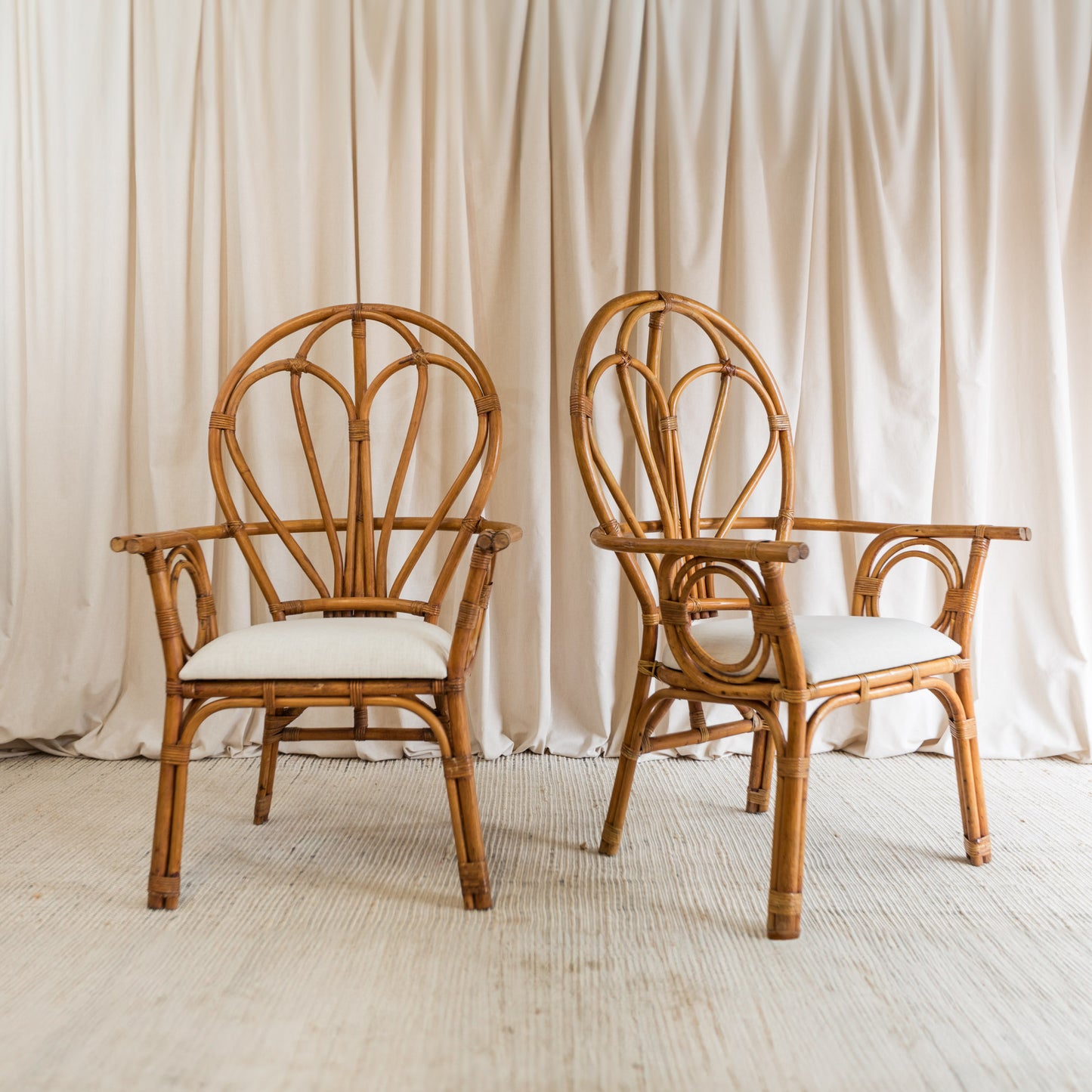 Rattan upholstered armchairs